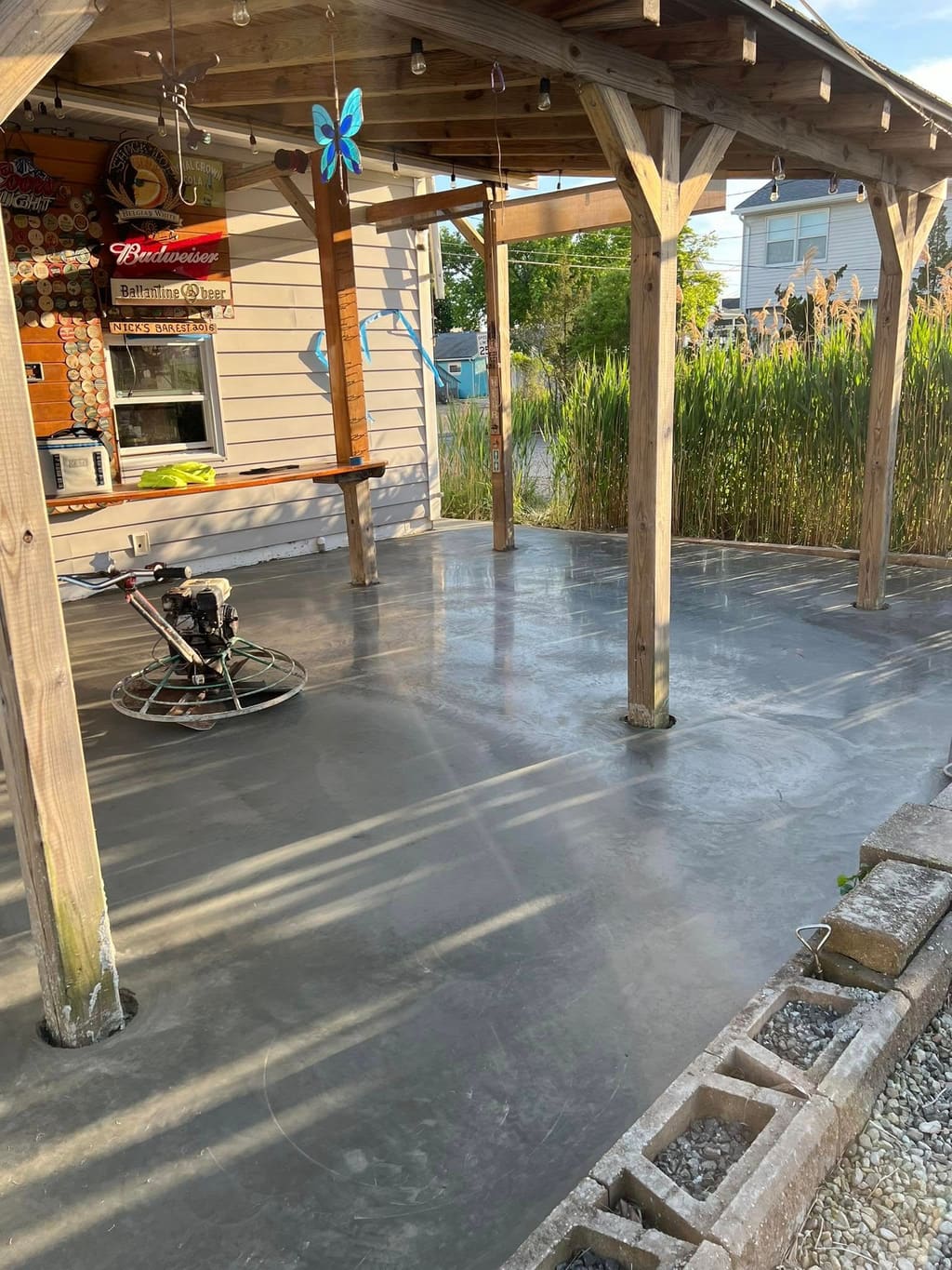 Covered outdoor concrete pad